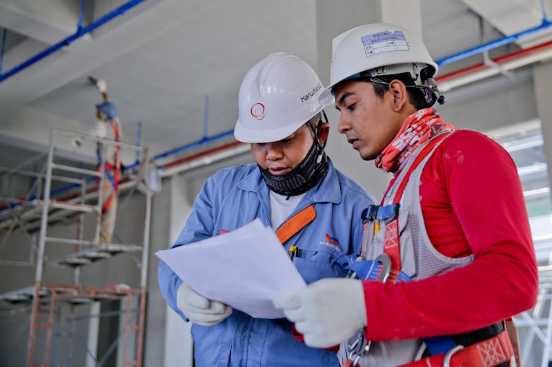 Construction workers on building site
